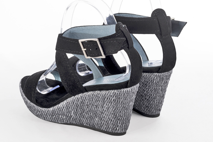 Matt black women's fully open sandals, with crossed straps. Round toe. High wedge soles. Rear view - Florence KOOIJMAN